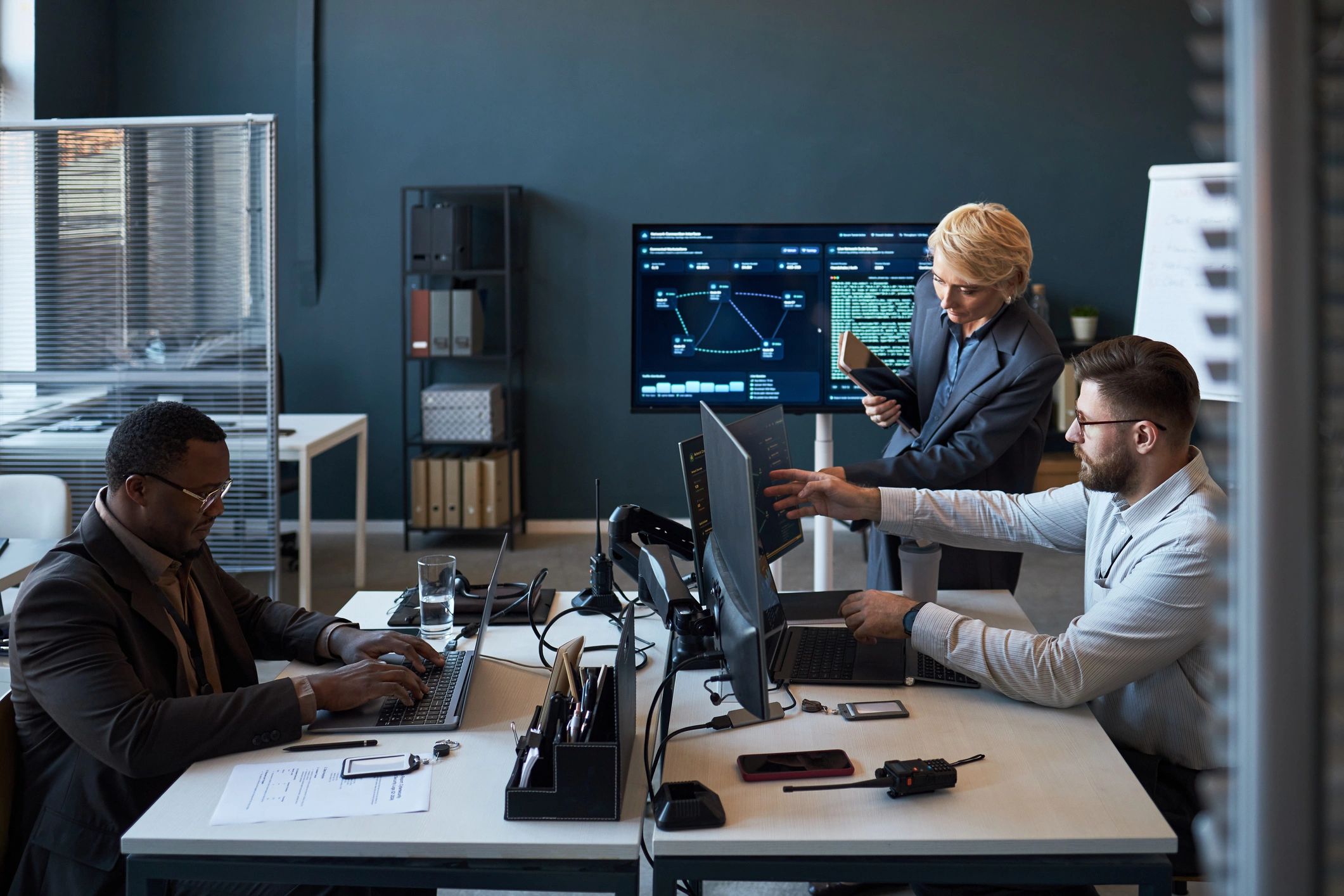 Business team reviewing digital workflow data